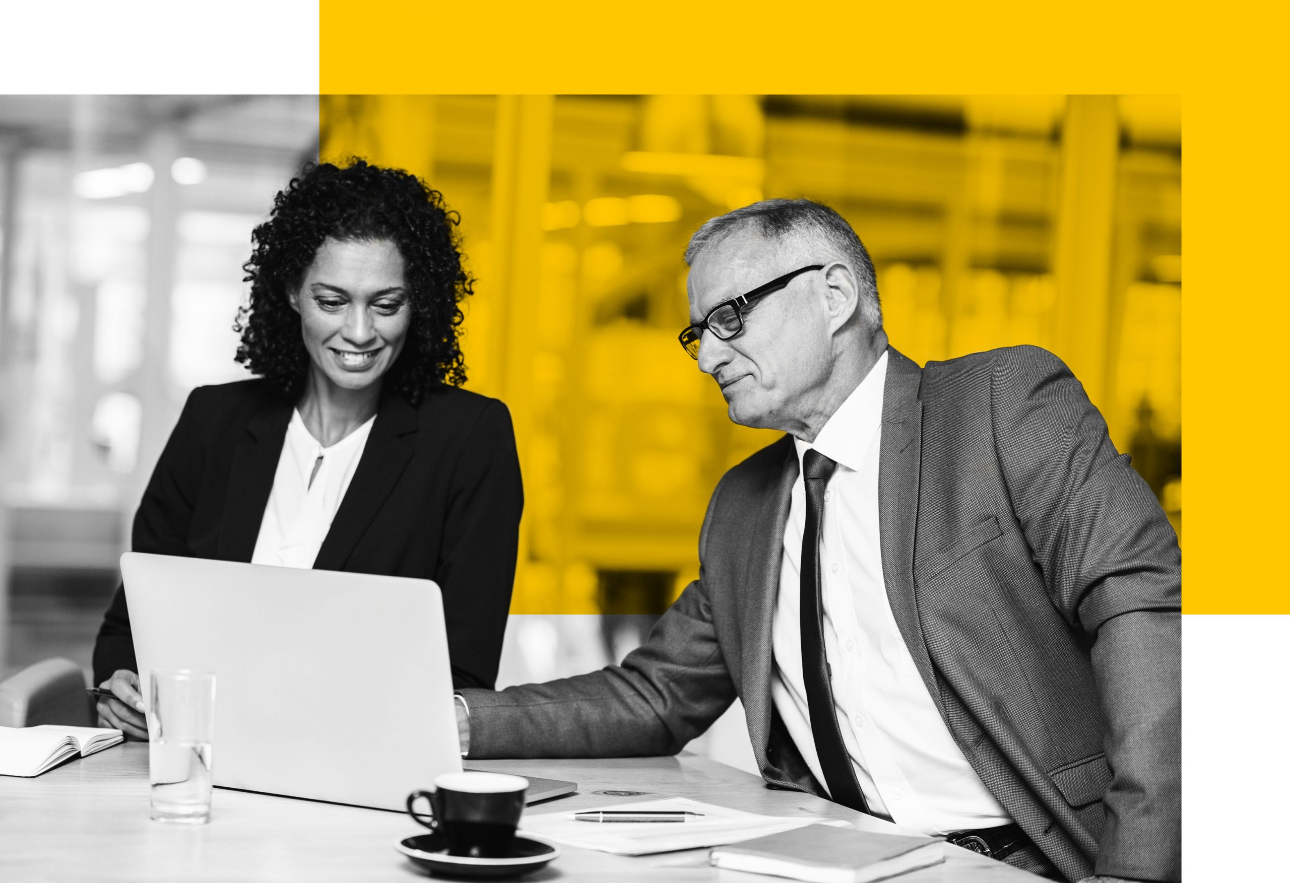 Female and male professionals reviewing survey results